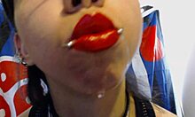 Young black haired teen gives wet tongue and red lips off